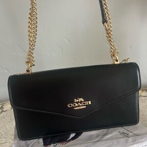 Coach Black Leather Shoulder Bag with Gold Chain Strap